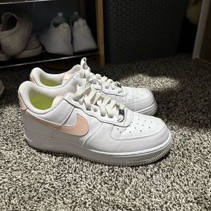 White Air Force ones with light pink swoosh